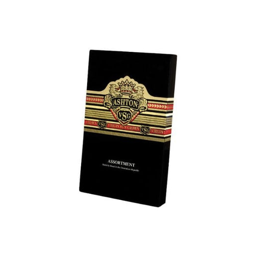 A black box labeled "Ashton VSG Sampler Box" by Ashton, featuring gold, red, and cream decorative accents with a crest design—a premium gift box containing an exceptional Ashton VSG cigar selection.