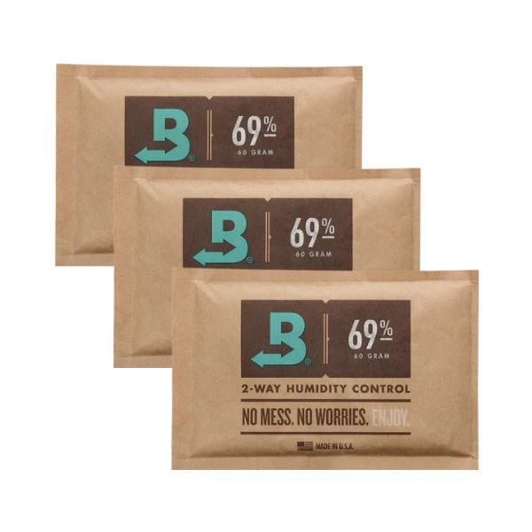 Three Boveda Humidity Control Packs (69%, 60g, 3-Pack) are shown, each designed for effortless cigar humidification with the slogan "No Mess. No Worries. Enjoy." Perfect for maintaining ideal conditions in your humidor.