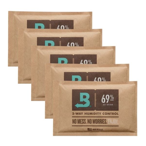 The Boveda 69% Humidity Control Pack - 5 Pack (60g) by Boveda Humidity Control Packs is ideal for keeping your cigar humidor at the perfect humidity level. Five packs are shown arranged in a staggered row on a white background.