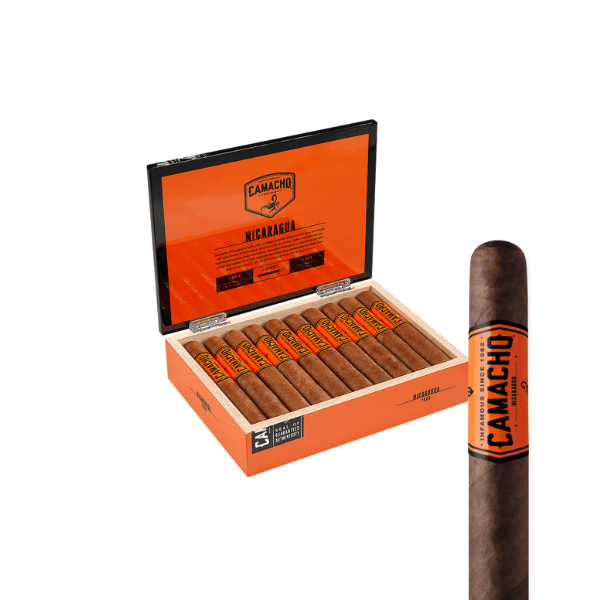 An open orange Camacho box labeled "Camacho Nicaragua" displays ten Camacho Nicaragua Toro cigars, with one in the foreground featuring an orange and black band and an Ecuadorian Habano 2000 wrapper.