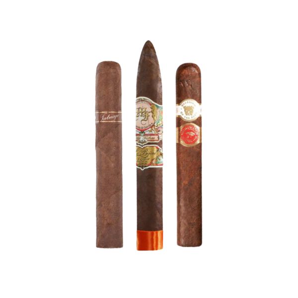 Three premium cigars from After Action Cigars' Rare Breed Boutique Sampler stand upright with decorative bands on a white background, highlighting the sampler's boutique appeal.