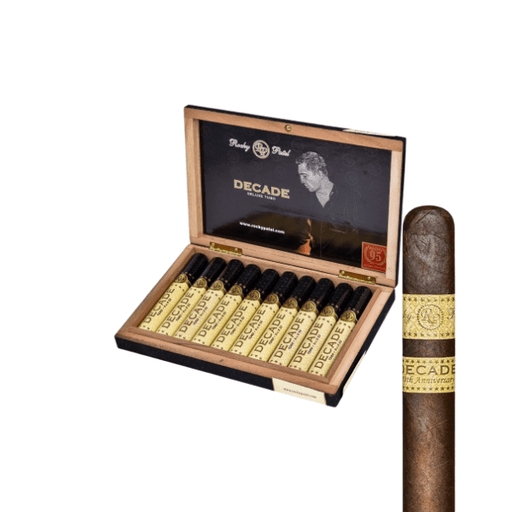 An open box of Rocky Patel Decade Toro cigars by Rocky Patel, each topped with gold bands, is neatly arranged; one cigar featuring its rich Sumatra wrapper is displayed in front for a closer look.