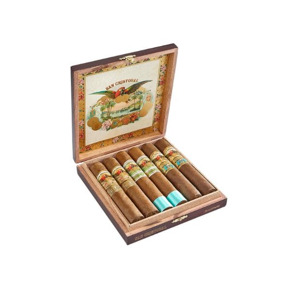 An open San Cristobal 60-Ring Assortment cigar box displays five large-ring premium Nicaraguan cigars with colorful bands, set against an ornate lid with decorative artwork and text.