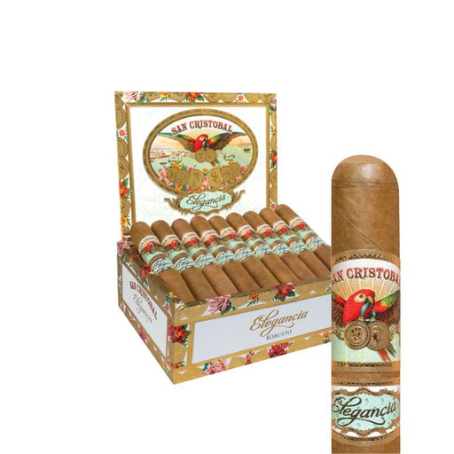 An open box of San Cristobal Cigars’ Elegancia Imperial Connecticut-wrapped Nicaraguan cigars displays detailed labels in neat rows, with one Elegancia Imperial shown in close-up on the right.