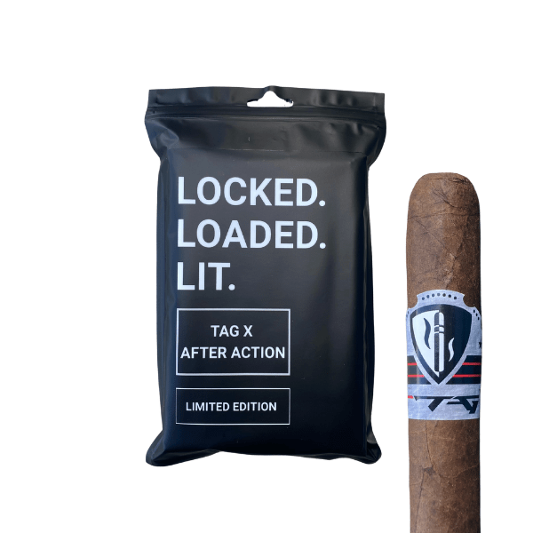 A black resealable bag labeled "LOCKED. LOADED. LIT." sits next to the TAG x After Action Limited-Edition Cigar (5-Pack) from After Action Cigars, featuring a branded band and exclusive TAG Firearms collaboration.