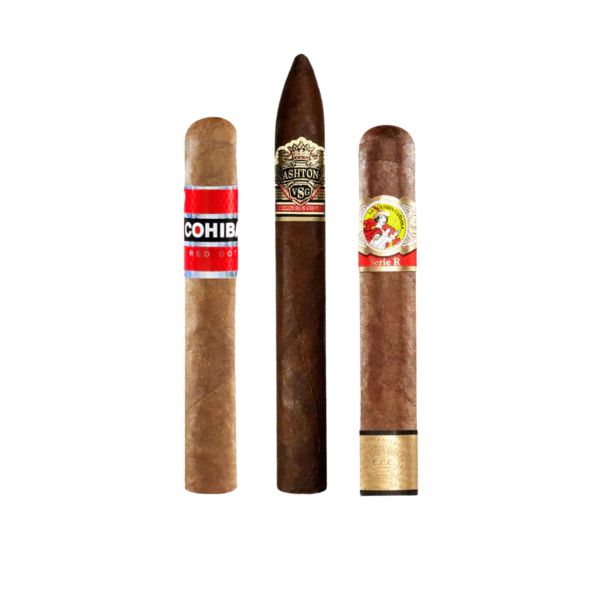 Three cigars stand upright side by side—a premium Top Shelf Selection Sampler from After Action Cigars—displayed against a clean white background.