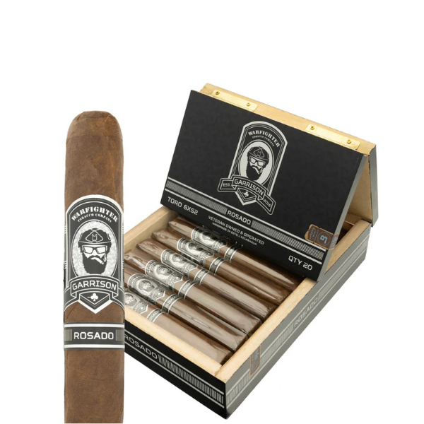A partially open box of Warfighter Tobacco Warfighter 762 Garrison Rosado Robusto cigars shows several inside, with one in the foreground, each featuring a premium Ecuadorian Rosado wrapper.