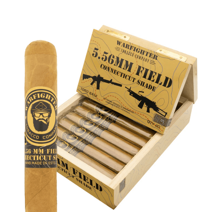 An open box of Warfighter Tobacco Warfighter 5.56 Field Connecticut Shade Robusto cigars, with several cigars visible inside and one featured in the foreground.