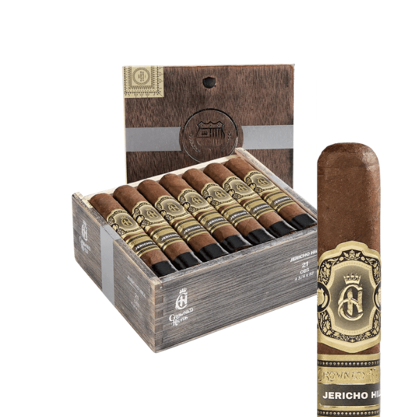 Open box of Crowned Heads Jericho Hill OBS cigars with one cigar shown close up on the right, all featuring rich brown Mexican San Andrés wrappers and gold-and-black bands crafted by My Father Cigars.