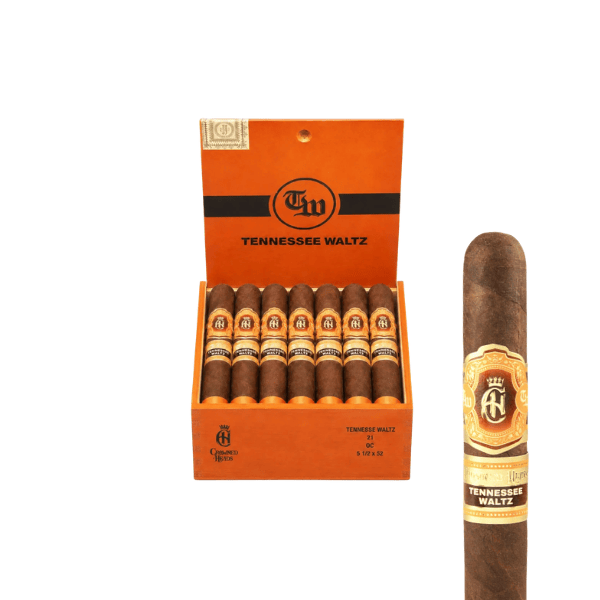 An open orange box labeled “Tennessee Waltz” displays eight brown Crowned Heads Tennessee Waltz Toro cigars, with one cigar shown close up on the right featuring a gold and red band—a signature look of this Toro, crafted with a rich Connecticut Broadleaf wrapper.