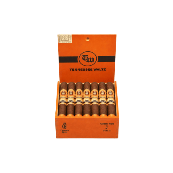 An open orange box labeled “Tennessee Waltz” contains ten Crowned Heads Tennessee Waltz Toro cigars arranged in a single row, each featuring a matching band and label. These expertly crafted cigars showcase a rich Connecticut Broadleaf wrapper, providing an exceptional smoking experience.