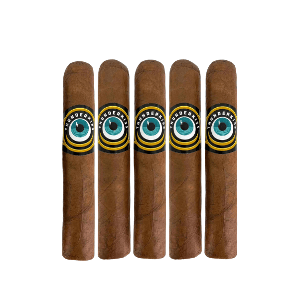 Five brown Crowned Heads Thunderkiss Robusto cigars, each with distinctive “THUNDERKISS” bands adorned by a bold, yellow and black circular logo, are arranged upright in a row on a white backdrop. The rich Ecuadorian Habano Maduro wrappers evoke the premium quality and refined appearance characteristic of the Crowned Heads Thunderkiss line.