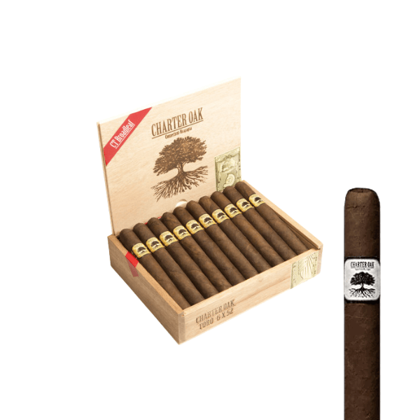 An open wooden box of Foundation Charter Oak Maduro Toro cigars reveals rows of Nicaraguan cigars adorned with branded bands. To the right, a single Foundation Charter Oak Maduro Toro—wrapped in a rich Connecticut Broadleaf Maduro—is displayed separately against a white background.