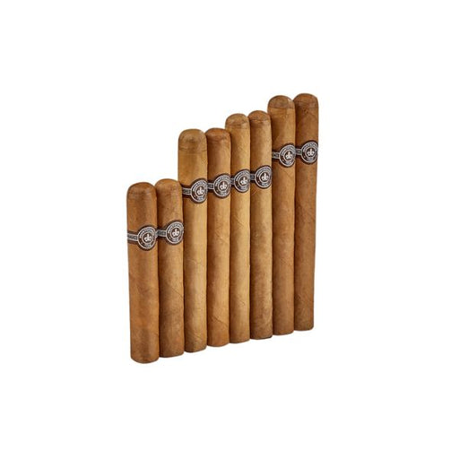Eight Montecristo Flight Sampler cigars, each with a band, are lined up on a white background—a premium selection from Montecristo perfect for cigar enthusiasts.