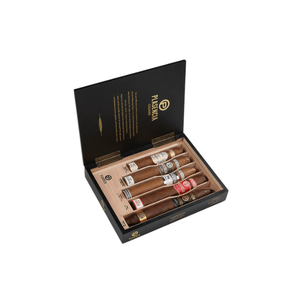 The Plasencia 5 Cigar Box Sampler by Plasencia Cigars features five premium cigars, each in its own slot with unique bands, housed in a sleek black box. The open lid displays elegant gold text, highlighting Plasencia’s renowned quality.
