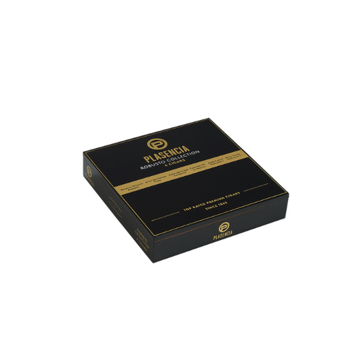 A black rectangular box labeled "Plasencia 6 Cigar Robusto Sampler" with gold accents, shown at an angle on a white background—a premium Plasencia selection of handcrafted Nicaraguan cigars.