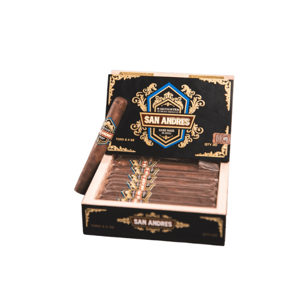 An open box of Warfighter San Andres Toro cigars with one cigar leaning against the box displays the striking black and gold packaging. Handcrafted in Nicaragua, Warfighter San Andres Toro features a luxurious Mexican San Andrés wrapper, delivering an exceptional premium smoking experience.